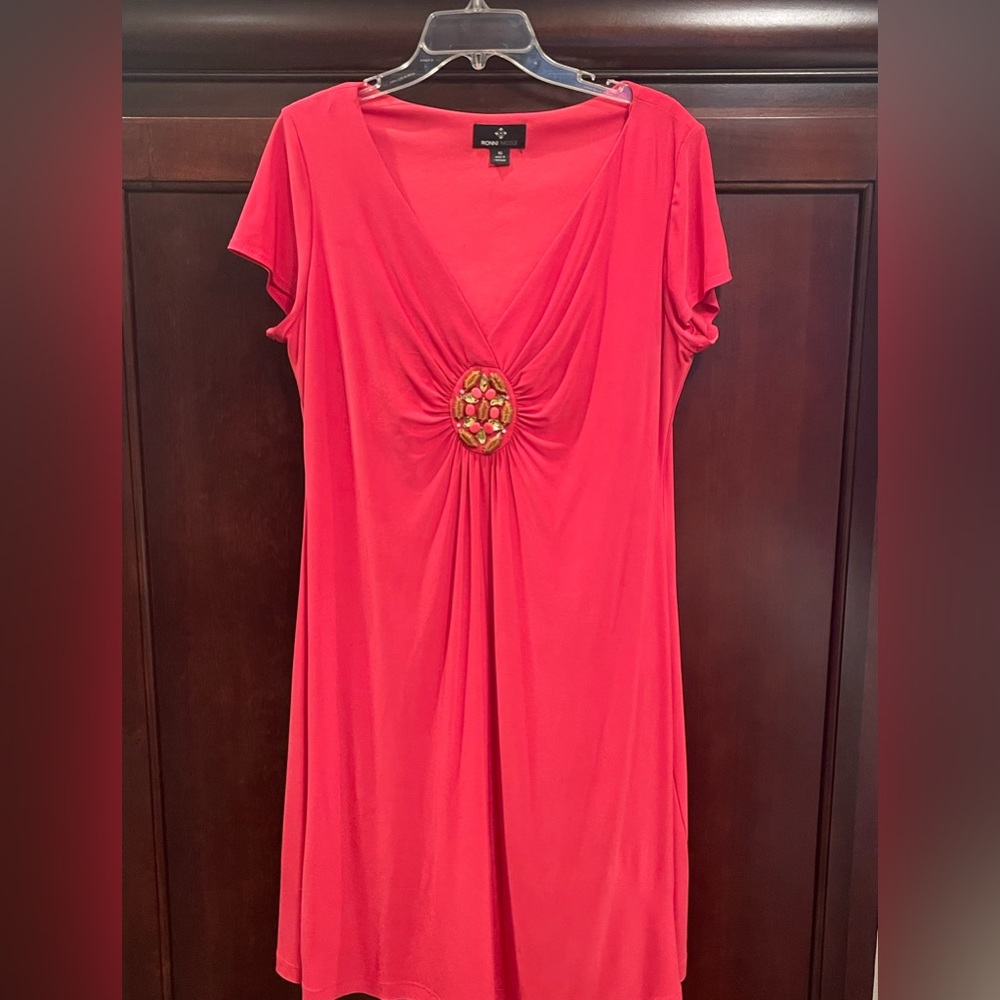 Ronni Nicole brand coral color dress with jeweled front. Size 16